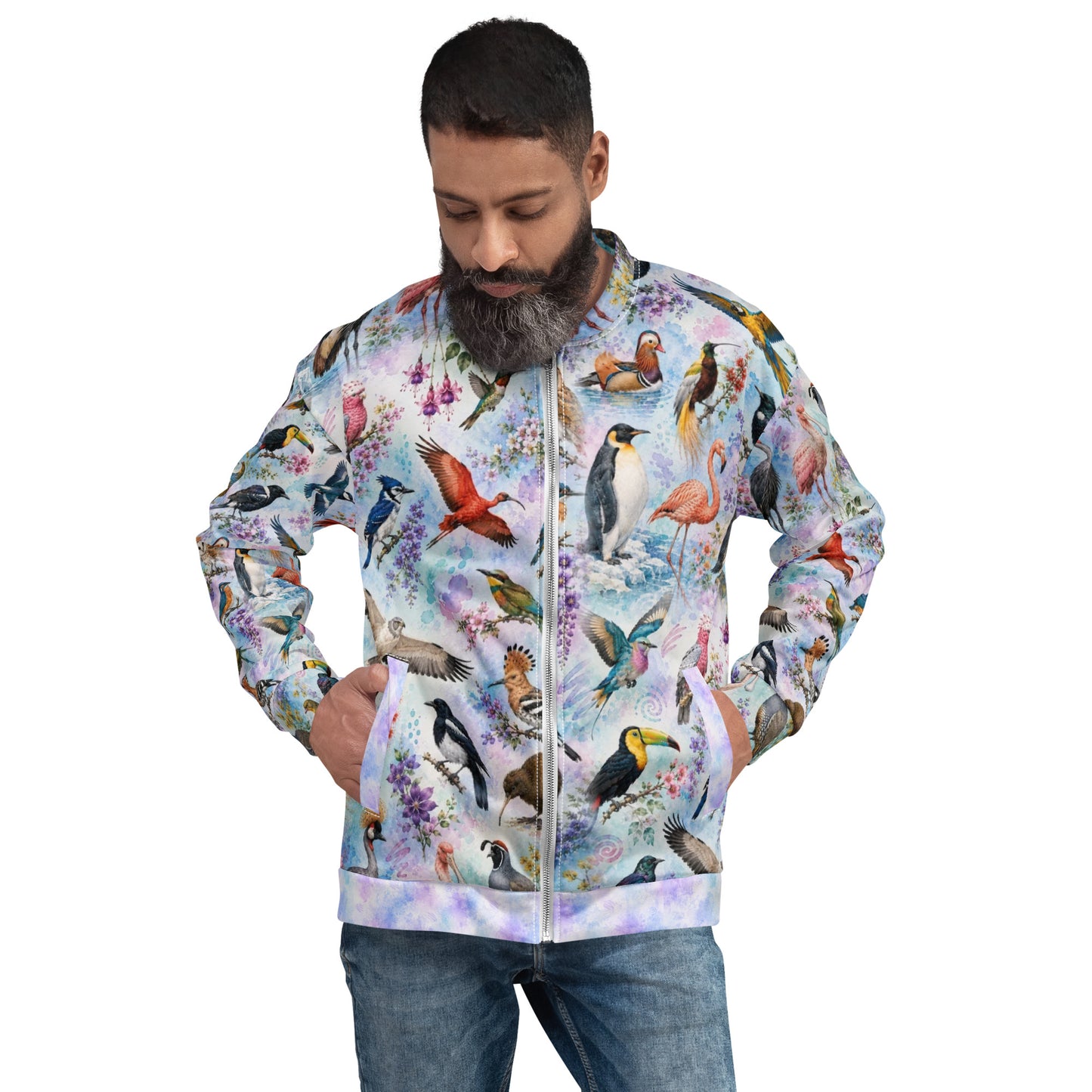 A man wearing a light blue and white bomber jacket covered in a colorful bird print, paired with blue jeans, shown against a plain white background.