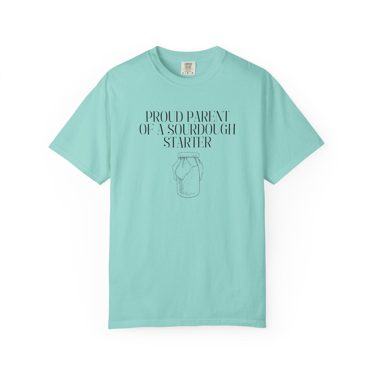 Chalky mint green Comfort Colors® "Proud Parent of a Sourdough Starter" graphic t-shirt on a white background with vintage sourdough starter jar illustration. Funny gift for sourdough bakers and bread enthusiasts.