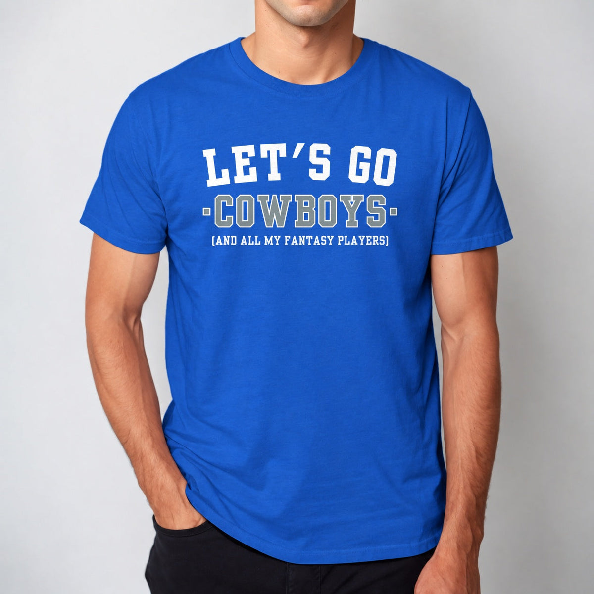 Man wearing the royal blue Let's Go Cowboys fantasy football t-shirt with collegiate block lettering