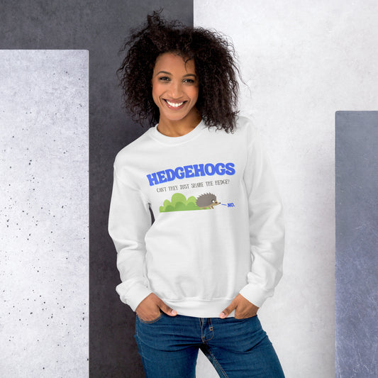 Smiling woman wearing the white funny hedgehog sweatshirt with jeans, showing the hedgehog share-the-hedge pun animal design.